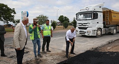 Memduh Büyükkılıç asfalt serdi