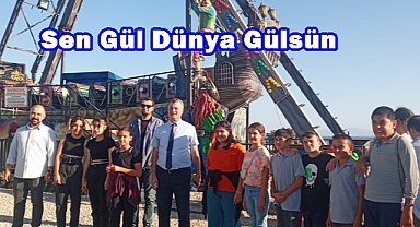 SEN GÜL DÜNYA GÜLSÜN